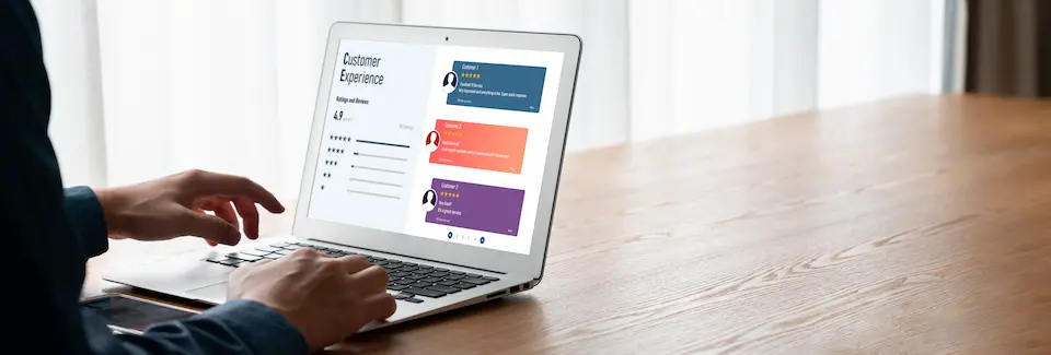 PC画面に表示された複数アカウントと、操作する男性のイメージ画像